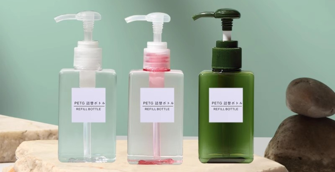 Liquid dispensing bottle