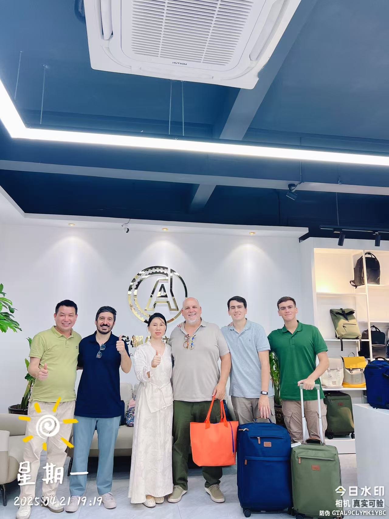 A busy aisle at the Canton Fair with many booths and people
