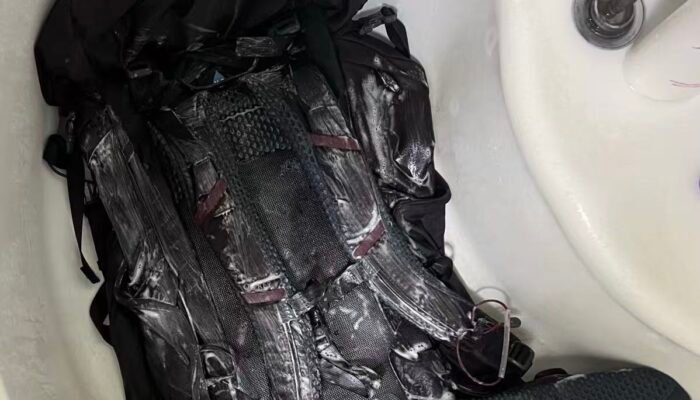 Wash the black backpack